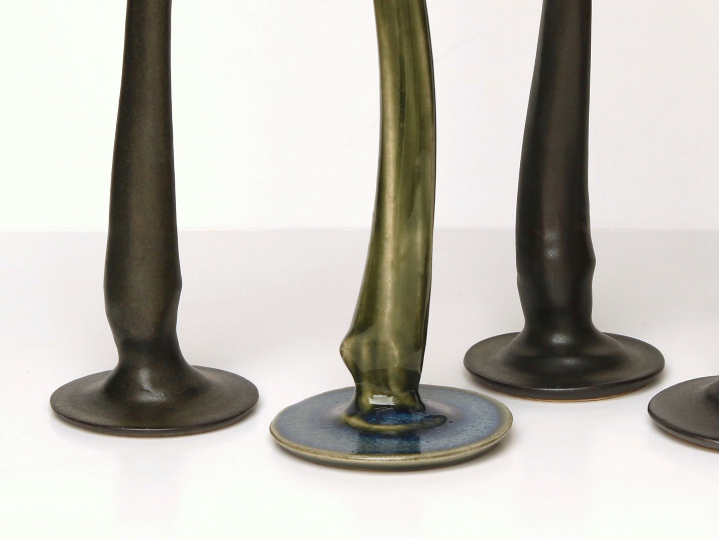 detail of black and wood ash candlesticks